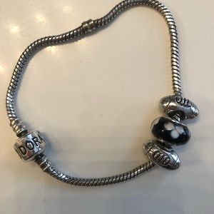Pandora football charm 1.  Rest not included.